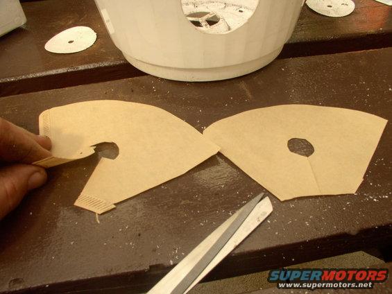 img_0007.jpg Slice up the coffee filter halves like this, with a small hole to allow for the plant stalk.