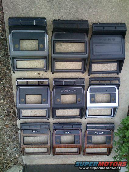 Nine dashboard trim pieces for Ford trucks, some labeled XL, XLT, and CUSTOM