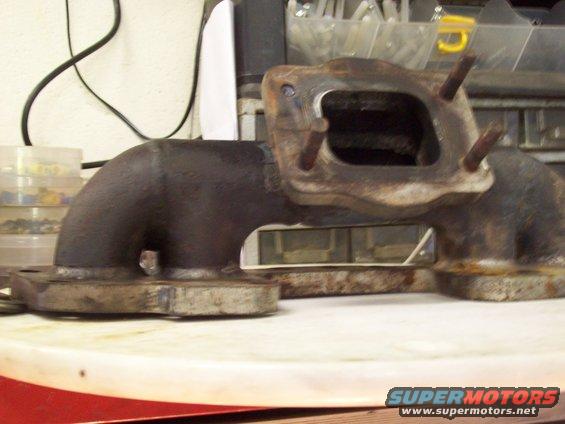 Exhaust manifold with four studs and a flange