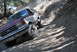 1996 Ford Bronco - This 1996 Ford Bronco navigates a steep, dusty off-road path.
