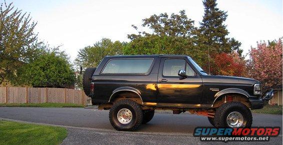Lifted black 1992 Ford Bronco side view