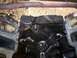1990 Ford Bronco - Oily engine block part with internal components visible.