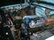 1982 Ford Bronco - The engine bay shows a blue engine with silver Summit valve covers, suggesting a modified or swapped engine.