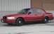 2000 Ford Crown Victoria - Side view of a red 2000 Ford Crown Victoria sedan.