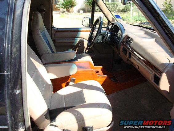 Console out of a conversion van...maybe???

If you can find one it is one of the best additions you could make to the interior.