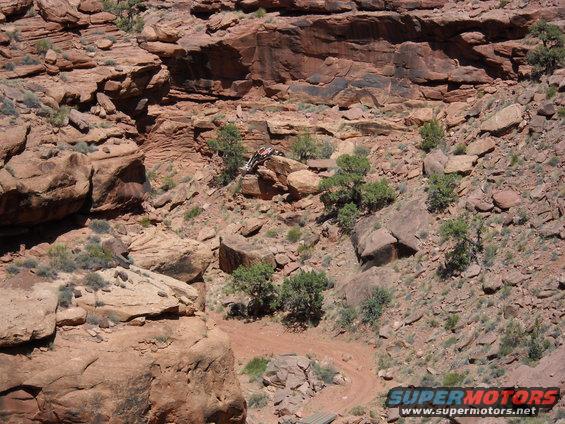 Off-road vehicle on rocky terrain, angled view