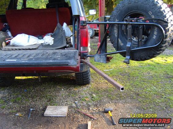 1989 Ford Bronco rear cargo area open, showing spare tire carrier mounted externally