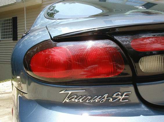 1999 Ford Taurus taillight assembly, rear quarter panel visible