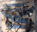 1992 Ford Explorer - Disassembled vehicle suspension parts are shown on a wooden board.