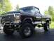 1979 Ford F-250 - This lifted 1979 Ford F-250 pickup truck is shown from a three-quarter front angle.
