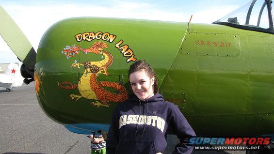 Next to a training plane -- or something. :D