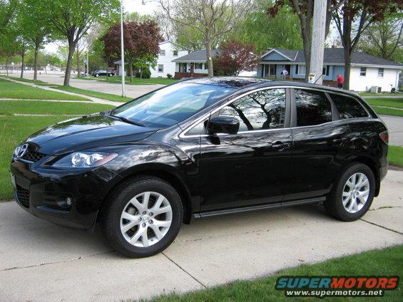 Black 2007 Mazda CX-7 parked on a suburban driveway