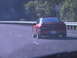 1989 Nissan 300ZX - Red coupe driving on a highway, license plate 218-TRV visible.