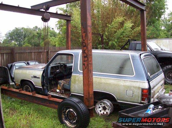 1988 Dodge Power Ram SUV side view, two-tone paint, on trailer