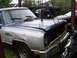 1988 Dodge Power Ram - This 1988 Dodge Power Ram pickup truck is being worked on, with chains attached to the front.