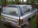 1988 Dodge Power Ram - This Dodge Ramcharger appears to be in a state of disrepair, with a damaged rear window and dirty exterior.