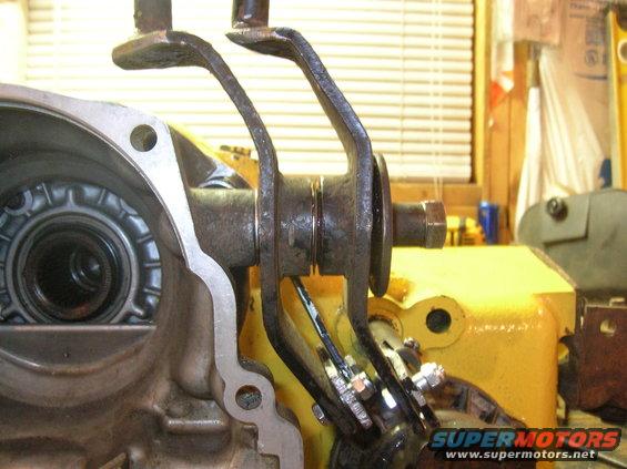 I tried to thin two identical shifters as much as possible, and added metal bushings and a longer bolt. I also greased the crap out of  it all.