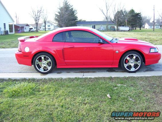 Red 2004 Ford Mustang coupe side view