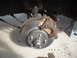 1971 Ford Torino - Close-up view of a vehicle's front brake rotor and caliper, with a Supermotors.net watermark visible.