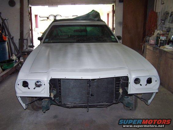 1975 Ford Ranchero front end disassembled, primer white