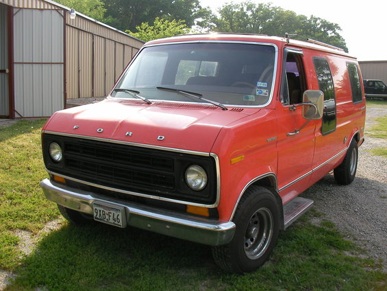 Red van with chrome bumper and black grille. License plate reads 9XB F46