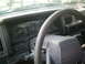 1993 Nissan Pathfinder - The interior dashboard of a 1993 Nissan Pathfinder, showing the steering wheel and instrument cluster.