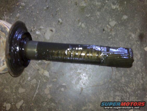 Driveshaft part with splined end and a rubber boot