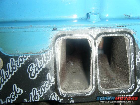 Close-up of an Edelbrock intake manifold gasket with two port openings