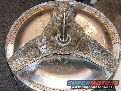 Washing machine drum and agitator with heavy mineral buildup