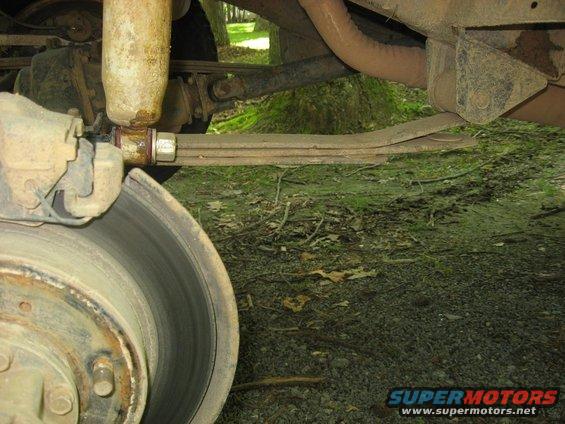 1987 Suzuki Samurai rear leaf spring suspension, shock absorber, and brake rotor