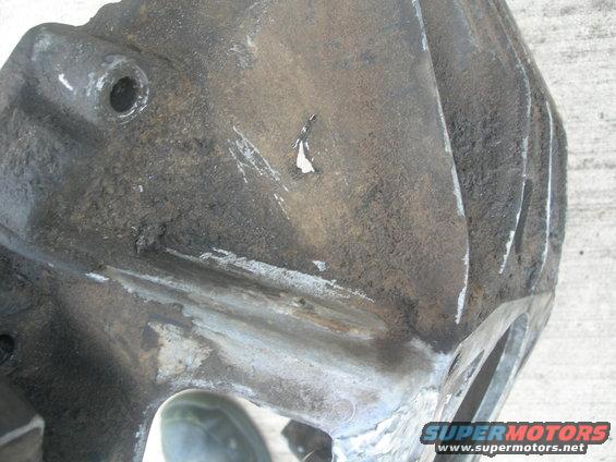 dscn2151.jpg Notice that light spot next to the rib?  That is a hole in the casting.  J U N K that I am expected to work with.