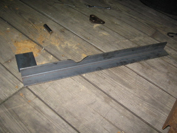 Metal bracket on wooden deck