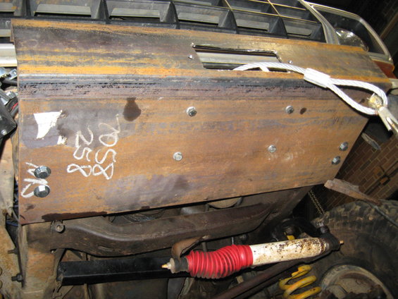 Custom skid plate with chalk markings '7058 258'