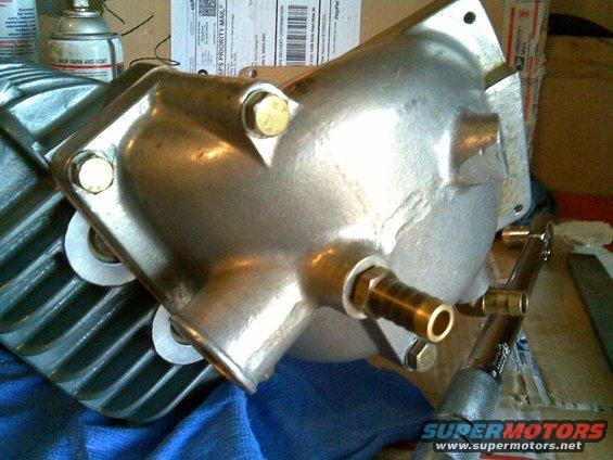 intakeelbow.jpg intake elbow installed with a little Permatex Red 'Hylomar' anerobic sealant on my homemade gasket