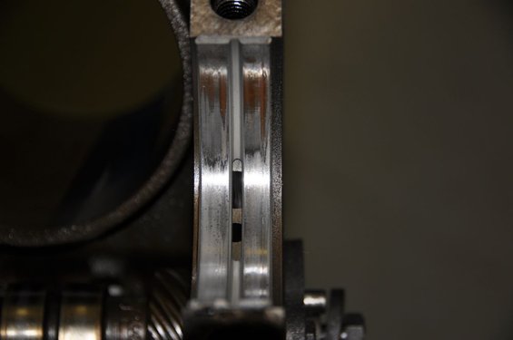 Close-up of an engine bearing with wear marks