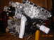 1995 Ford Taurus - Engine assembly with visible oil filter and date stamp from 2009.