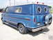 1978 Ford E150 - This van has custom pinstriping and a spare tire mounted on the rear.