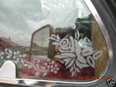 The etched glass work is still there.