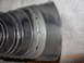1995 Ford Taurus - Close-up view of engine bearings, showing wear patterns and lubrication holes.