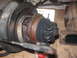 1989 Ford Bronco - A turbocharger part is shown in detail, with a license plate in the background.