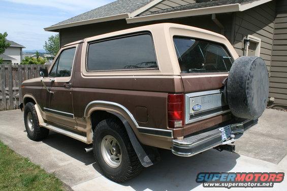 Brown 1984 Ford Bronco rear 3/4 view with spare tire