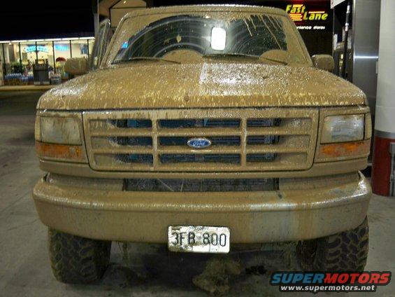 Mud-covered 1992 Ford F-Series truck front view, license plate 3FB 800 visible