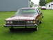1984 Mercury Grand Marquis - This 1984 Mercury Grand Marquis sedan is shown from the front, parked on a grassy lawn.