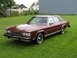 1984 Mercury Grand Marquis - Maroon 1984 Mercury Grand Marquis LS sits on a green lawn.