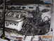 1995 Ford Taurus - Engine bay of a 1995 Ford Taurus, its V6 DOHC engine.