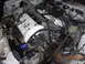 1995 Ford Taurus - Close-up view of a disassembled engine bay, showing internal components and wiring.