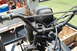 1985 Ford Ranger - Close-up view of the engine and handlebars of an unidentified vintage vehicle.