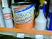 1985 Ford Ranger - A can of chemical cleaner sits on a shelf next to other automotive products.