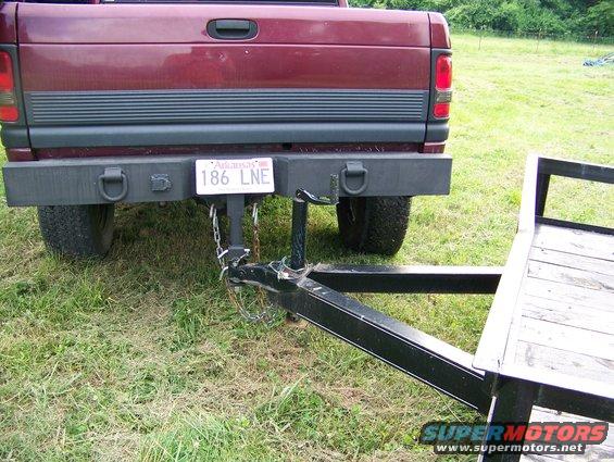 2001 Dodge 1500 pickup truck with a trailer attached to the hitch