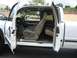 1979 Chevrolet C/K Pickup - Interior of a white pickup truck, viewed from the passenger side with doors open.